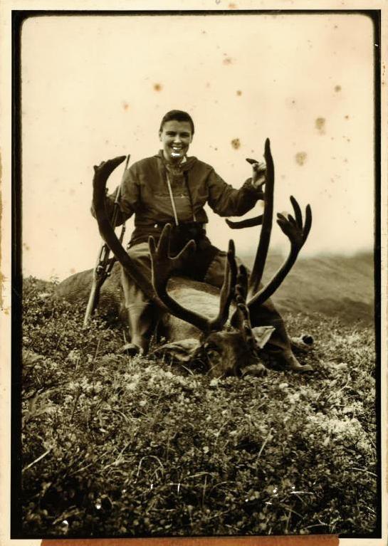 Virginia Kraft poses with a Alaskan Caribou.